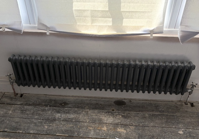 Column radiator installed by AFS Plumbing