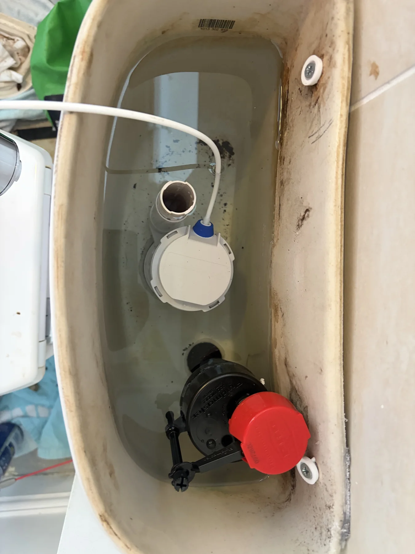 New fill and flush valves fitted during a toilet cistern rebuild in Broughton Astley