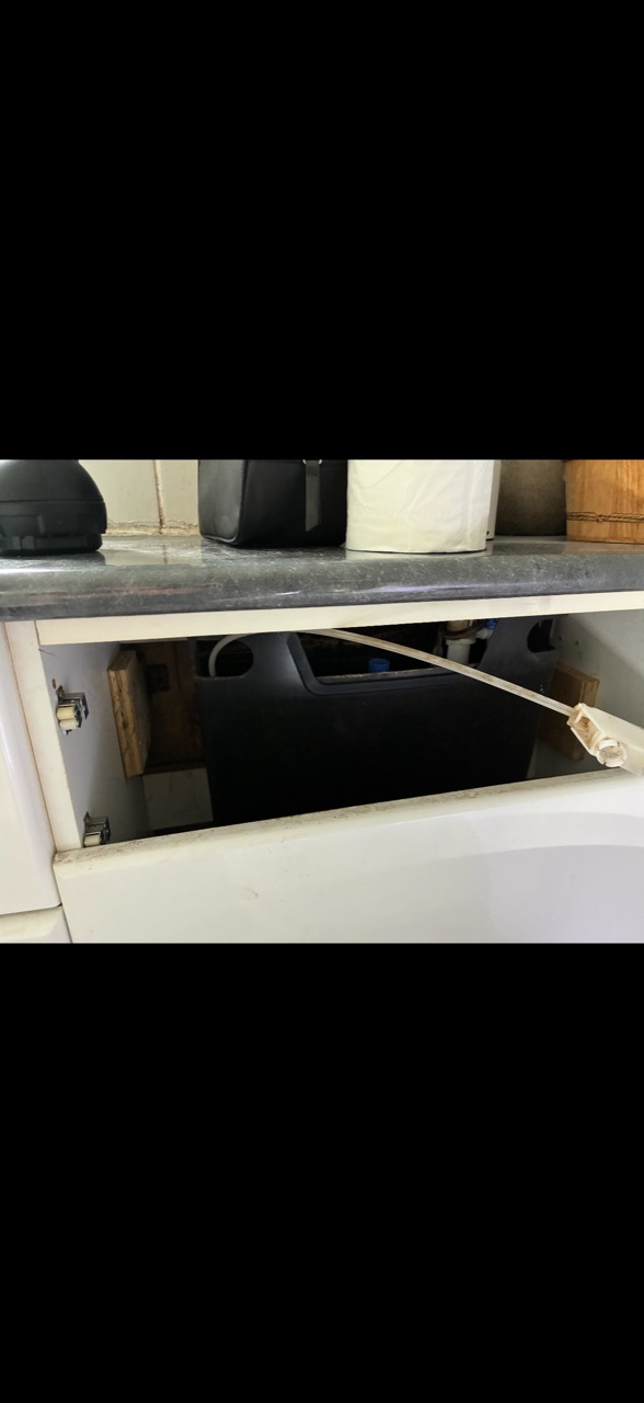 Leaking concealed toilet cistern exposed during a bank-holiday emergency call-out in Hinckley