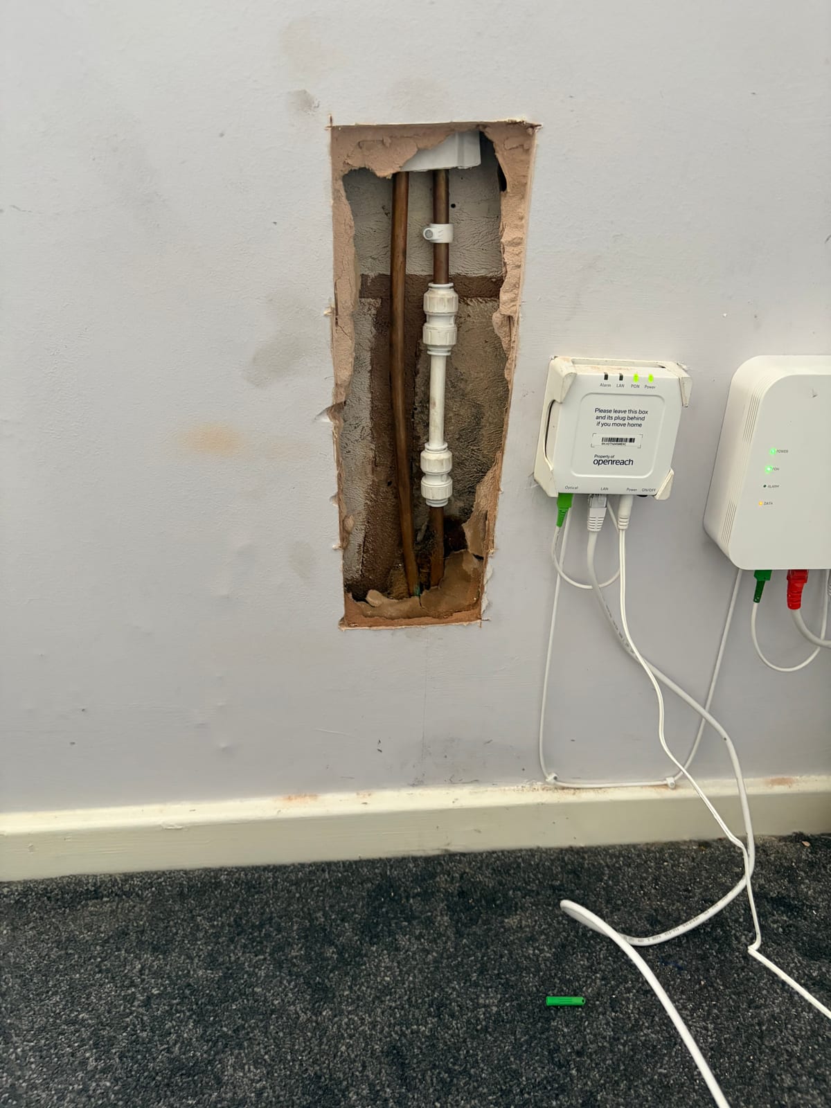 Heating pipe repaired beside broadband equipment after accidental drilling in Whetstone