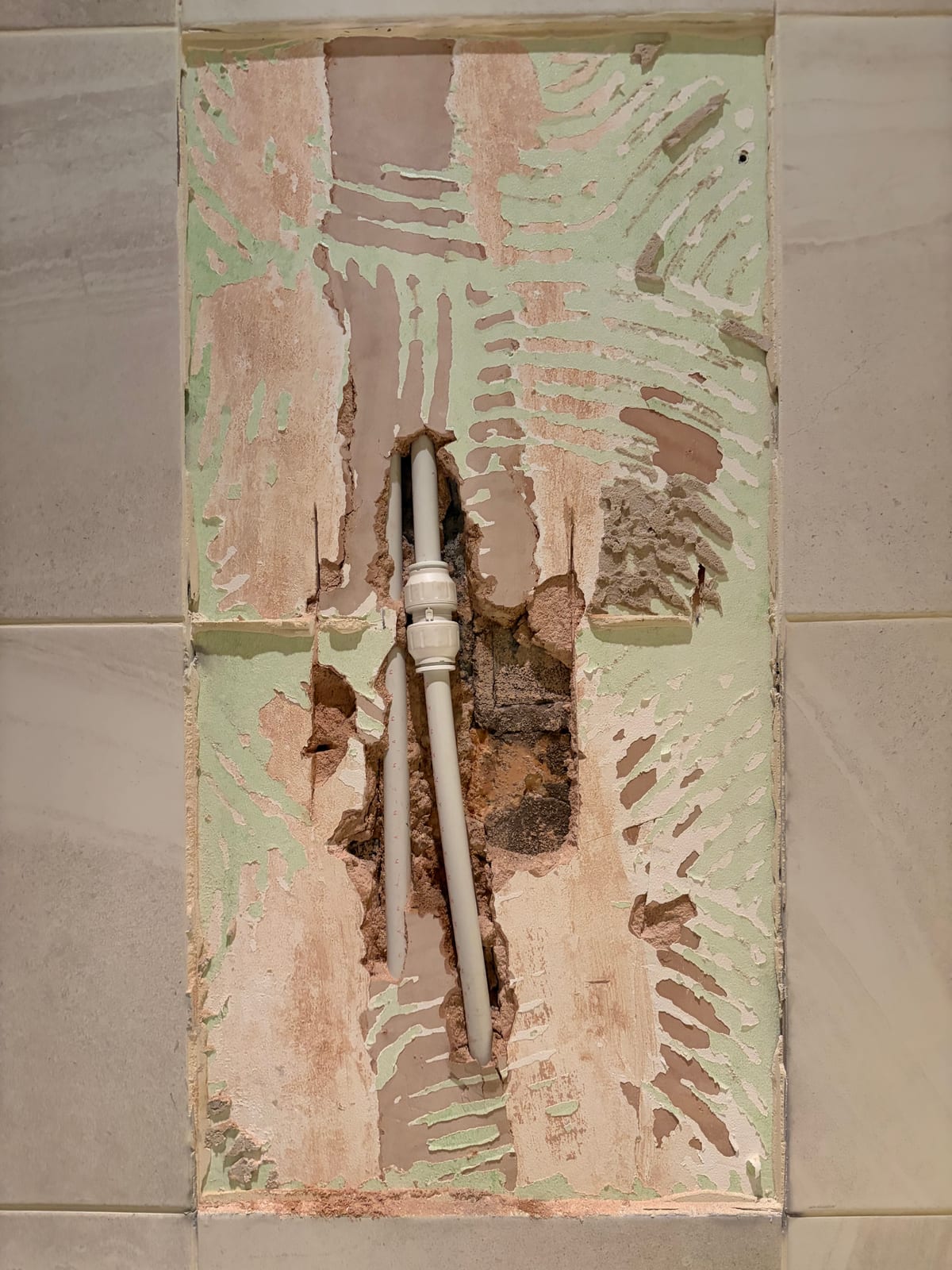 Concealed pipe repaired in Whetstone after the surrounding tile was saved intact