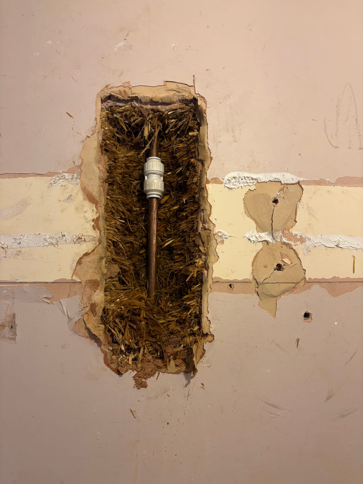 Concealed heating pipe repaired after being drilled in Wigston