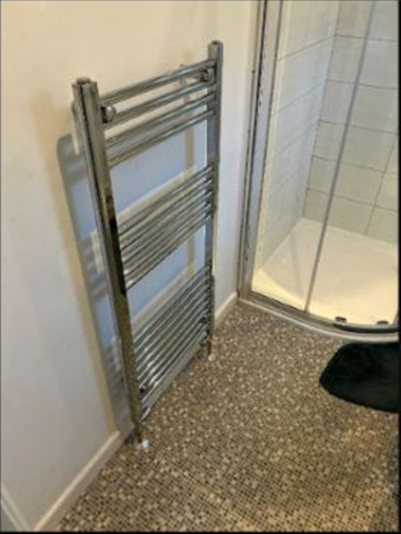 Heated towel rail plumbing completed by AFS Plumbing and Heating